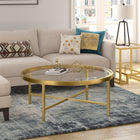 Hudson&Canal Xivil 36"W Round Coffee Table with Glass Top - Brass-Clean with a soft, dry cloth and no harsh chemicals or abrasive cleaning materials