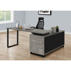 Monarch Specialties 7714 72" Computer Desk - Grey Concrete/Black Executive Corner-Desktop is divided into 2 segments: a large, main worksurface and a smaller, lower surface on top of the shelving unit