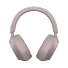 Sony WH1000XM5 Wireless Noise-Cancelling Headphones - Pink-Multi Noise Sensor technology - With 8 total microphones, these headphone are our biggest step forward in noise cancelling technology. Ambient sound is captured even more accurately for a dramatic reduction in high frequency noise. Thanks to Auto NC Optimizer, noise cancelling performance is always and automatically optimized based on wearing conditions and external environmental factors such as atmospheric pressure.