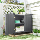 Outsunny Garden Storage Cabinet with Galvanized Top & Shelf-Dual doors with magnetic closing on this garden storage cabinet allow easy equipment access  

