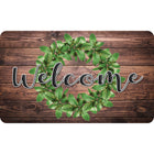 Ashley Productions The Original Fun Mat Welcome Mat - 18" x 30" - Green Wreath on Wood Welcome-Measurements and Design: The Green Wreath on Wood Welcome Mat measures 18" x 30".