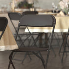 Flash Furniture HERCULES Series 650 lb. Capacity Premium Black Plastic Folding Chair-Black Powder Coated Frame Finish