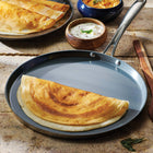 Tramontina Utsava Tri-Ply Clad Stainless Steel Ceramic Nonstick Dosa Tawa-Tri-Ply Clad Design: Aluminum core between stainless steel layers provides fast, even heat distribution for consistent results