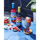 Torani Sugar Free Blue Raspberry Syrup - 750 mL - 4 Pack-More than just coffee: Great for lattes, frappes, teas, handcrafted sodas, lemonades, milkshakes, desserts and other frozen blended drinks