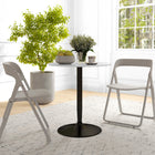 HOMCOM - Table à manger ronde avec base en acier et patin antidérapant pour salon - blanc-Il dispose d'une surface ronde et spacieuse pour poser vos plats et boissons 