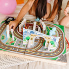 Melissa & Doug 18-Piece Wooden Take-Along Tabletop Town Set- Set up a bridge, city tunnel with monorail that slides across the top, buildings, traffic signs, tree 