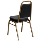 Flash Furniture HERCULES Series Trapezoidal Back Stacking Banquet Chair in Black Vinyl - Gold Frame-Trapezoidal Back Design
