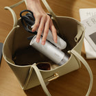 Mova Flip 10 Hair Dryer - White-Frizz-Free & Shine-Boosting: 300 million negative ions/cm³ help reduce frizz and boost shine—for a silky, smooth finish.