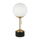 Hudson&Canal Reagan 17.75" Tall Table Lamp with Glass Shade - Brass/ Black Marble/White Milk-Paired with a white globe glass shade