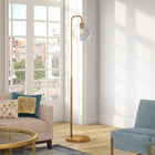 Hudson&Canal Harrison Arc Floor Lamp with Glass Shade - Brass/Clear-Handcrafted brass finish is applied to the round metal base