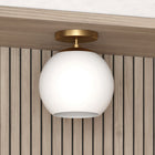 Hudson&Canal Bartlett 9" Wide Semi Flush Mount with Glass Shade - Brass/White Milk-Handcrafted brass finish is applied to the globe metal base