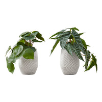 Monarch Specialties 8" Artificial Indoor Alocasia - Table - White Cement Pots - Set of 2-Turn any space into an oasis with this set of 2 artificial Alocasia plants that stand up to 8" tall, adding some vibrant greenery to your home or office