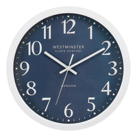 Monarch Specialties 9116 12" Round Wall Clock - Blue Face/White Frame-Elevate your home decor with this 12" round wall clock featuring a stylish blue face and a striking white frame, perfect for any contemporary space