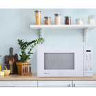 Magic Chef 1.1 cu. ft. 1000W Countertop Microwave Oven - White-Convenient auto defrost modes by weight or time