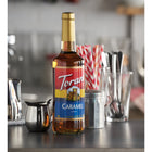 Torani Classic Caramel Syrup with Pump - 750 mL-Pump included: Dispenses the perfect amount (1/4 oz) of syrup every time