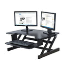 Rocelco – Ensemble d’élévateur de bureau ajustable ADR et planche Indo Board originale-L’ADR de Rocelco est doté de surfaces en métal et en bois. La planche Indo Board pour bureau est fabriquée de bois massif avec un fini texturé pour une position confortable.