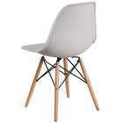 Flash Furniture - Chaise en plastique blanc de la série Elon avec pieds de bois-Finition en plastique blanc