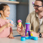 Kinetic Sand Soft Serve Station -14oz colored sand, cones & tools: Unbox blue, pink & white sand! Top cones with molded details from the scoop & add sprinkles with the grater. Make your ice cream creations & squish to create again!