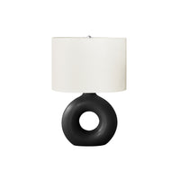 Monarch Specialties 24" H Contemporary Table Lamp - Black Ceramic / Ivory / Cream Shade-A contemporary and stylish 24"H table lamp featuring a trendy donut-shaped, matte black ceramic base, topped with an oval, ivory fabric shade and a round silver metal finial