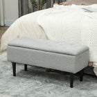 HOMCOM - Pouf de rangement avec pieds en bois et capacité de 57 L - gris-Le rangement sous l'assise vous permet de ranger des objets sans place attitrée 