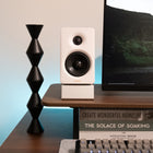 Edifier M60 Hi-Res Wireless Audio Touch Control Multimedia Bluetooth Speaker - White-Exclusive aluminum speaker stands that minimize sound coloration from desktop reflections. With a 15-degree angle, they direct sound precisely at ear level for an optimal experience.