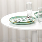 HOMCOM Round Dining Table with Non-slip Pad for Living Room - White-The non-slip pad on its base keeps the table stable and protects the floor from scratches