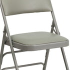 Flash Furniture – Chaise pliante en métal Hercules avec vinyle, 4 charnières et 3 renforts, gris, paq./4-Siège rembourré épais de 1 po avec mousse CAL 117
