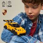 LEGO Speed Champions Porsche 911 GT3 RS Super Car-1 minifigure - Car playset includes a Porsche driver minifigure with a helmet for kids to place behind the wheel and stage races