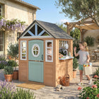 Qaba - Maison de jeu en bois pour enfants d’extérieur avec porte pour animaux, cuisine de jeu, demi-porte - bois naturel-La porte pour animaux permet aux compagnons à fourrure de participer aux aventures de la maisonnette
