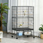 PawHut - Grande cage à oiseaux en métal 52 po H avec support roulant, étagère de rangement, perchoir en bois - gris foncé-Comprend 4 perchoirs en bois et 4 mangeoires en plastique 
