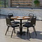 Flash Furniture 36" Round Walnut Laminate Table Set with X-Base & 4 Black Trapezoidal Back Banquet Chairs-Set Includes 4 Banquet Chairs, Round Table Top and X-Base