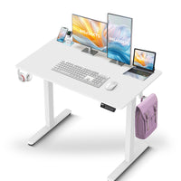 IMHome - Bureau assis-debout électrique réglable en hauteur avec 3 réglages de mémoire - 40 po x 24 po - Plateau blanc / structure blanche-Améliorez votre espace de travail avec le bureau assis-debout électrique IMHome, une solution polyvalente et riche en fonctionnalités pour les bureaux à domicile et les environnements professionnels. Ce bureau réglable en hauteur permet un ajustement électrique fluide de 28 po à 47 po (72 cm à 118 cm), vous permettant de passer facilement de la position assise à la posit