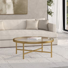 Hudson&Canal - Table basse ron Xivil 91 cm de large avec plateau en verre - Laiton-Le plateau de table a une capacité de poids de 50 lb