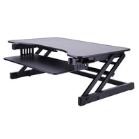 Rocelco 32" Sit-To-Stand Adjustable Height Desk Riser with Easy-Lift Handles - Black-Sturdy metal frame with easy-grip side handle and gas piston assist, can raise and lower up to 30 pounds with continuous height adjustment from 4.75" up to 16.75" above desktop to optimize the ergonomic work position for people of most heights