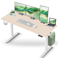 IMHome Height Adjustable Electric Standing Desk with 3 Memory Settings - 55" x 24" - Ivory Top/White Frame-Elevate your workspace with the IMHome Electric Standing Desk, a versatile and feature-rich solution for home offices and professional setups. This sit-stand desk offers smooth electric height adjustments from 28" to 47" (72cm to 118cm), allowing you to seamlessly switch between sitting and standing. With a built-in 3 memory settings, you can save your favorite height settings for ultimate convenience.