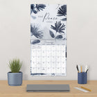 DateWorks 2026 16-Month Wall Calendar - 12" x 12" - Whisper Song - English-Features monthly pages for January to December 2026, as well as the last 4 months of 2025