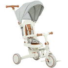 Qaba - Tricycle 7 en 1 pour tout-petits avec poignée parentale réglable et amovible - blanc crème-Le design 7-en-1 s’adapte à la croissance de votre enfant, économisant de l’argent et de l’espace 
