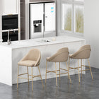 Manhattan Comfort - Gracie tabouret de bar moderne de 22" en similicuir, rembourré, beige et or, lot de 3-Le cadre et les pieds sont dotés d’un choix d’acier noir entièrement soudé ou d’acier inoxydable doré