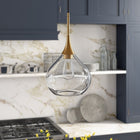 Hudson&Canal - Suspension Ida , 24 cm de large, avec abat-jour en verre - Laiton/Transparent-Une finition en laiton fabriquée à la main est appliquée à la base en métal de la gourde