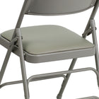 Flash Furniture HERCULES Series Curved Triple Braced & Double Hinged Grey Vinyl Metal Folding Chair-18 Gauge Steel Frame