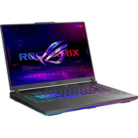 ASUS ROG Strix SCAR 16 G634 16" Laptop - Intel i9-14900HX - 1TB SSD - 32GB RAM - Windows 11 Pro-THE PINNACLE OF PERFORMANCE - Dominate the battlefield with Windows 11 Pro, a 14th Gen Intel Core i9-14900HX processor, and NVIDIA GeForce RTX 4080 Laptop GPU at 175W Max TGP, allowing you to handle even the most demanding games with ease.