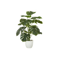 Monarch Specialties - Plante Artificielle - 24 po H - Monstera - Mis En Pot - Touche Réelle - Feuilles Vertes - Pot Blanc-Plante artificielle de monstera luxuriante et réaliste de 24 pouces de haut, placée dans un pot blanc moderne de 5 pouces, parfaite pour être placée sur une table ou une étagère pour une touche de verdure