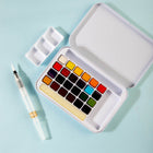 Mont Marte - Coffret de 27 peintures aquarelles en boîte métallique - Couleurs assorties-Convient aux techniques de brossage à sec, de lavis humide et de glacis lorsque vous souhaitez explorer différents effets