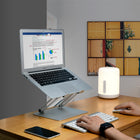 ShoppingAll Adjustable Laptop Stand - Silver-1 Year Limited Manufacturer Warranty