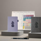 Wamaco Pineapple Passionate Planner Collection - Purple Planner, Grey Journal, Stickers, Notepad, Weekly Deskpad, Pen-Professional – The beautiful and fun look of this complete planning collection allows it to brighten any area, while showing professional organization.