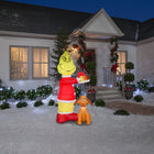 GEMMY Airblown Inflatable Christmas Grinch Putting Santa Hat on Max-Self-inflates in seconds and deflates for easy storage