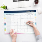 Emily Ley Simplified 2026-27 Happy Stripe Standard Desk Pad - 22" x 17" - Bilingual-An extra future reference calendar page is included for checking dates. Top binding features the year stamped in gold foil.