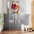 PawHut Retractable Dog Gate - Extends to 55" W-Simple one-handed operation allows for easy passage when your hands are full
