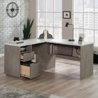 Sauder 59"W East Rock L-Desk - Ashen Oak-Lower drawer with full extension slides holds letter or legal size hanging files