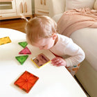 MAGNA-TILES Stardust 15-Piece Magnetic Construction Set-What Makes It Unique: Glitter and mirrored tiles add a little sparkle to playtime.  Reusable packaging turns into a castle setting to expand imaginative possibilities
